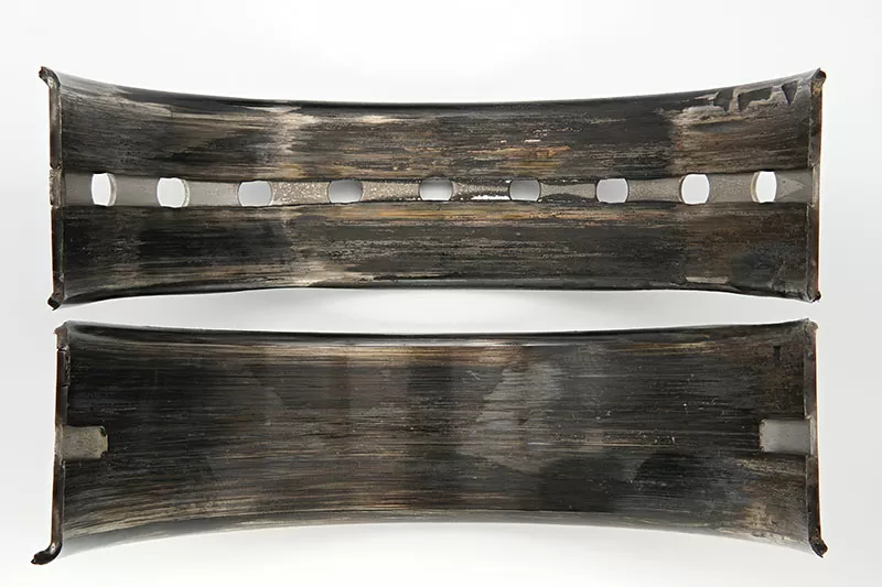Disassembled bearing showing damaged surface 