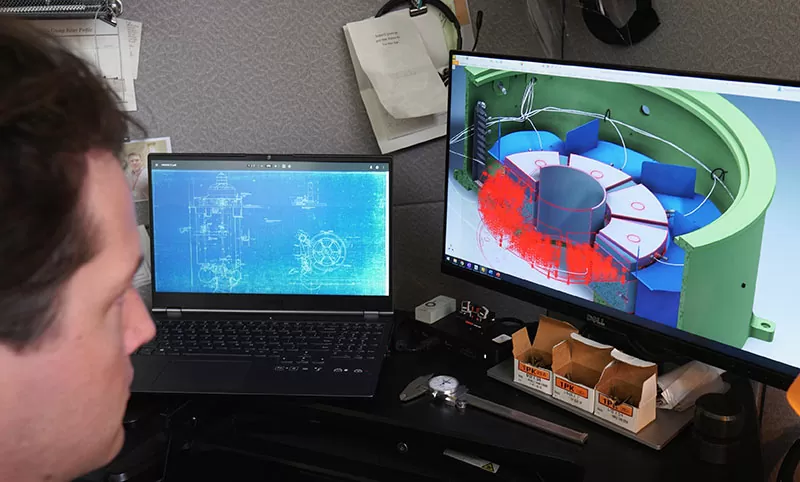 Pioneer member performing rotordynamics analysis on computers 